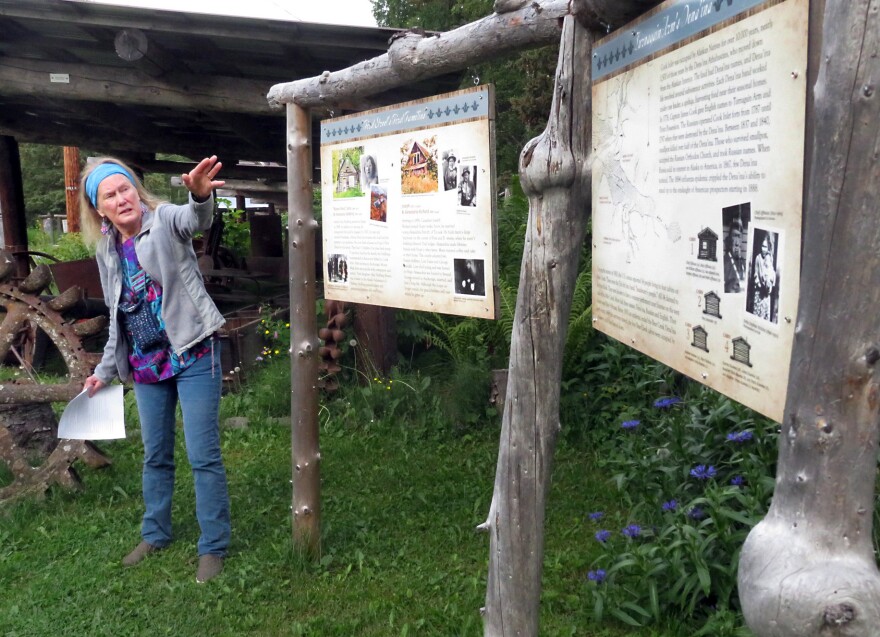 Diane Olthuis points gestures to an interpretive sign outside the Hope and Sunrise Historical and Mining Museum on Thursday, June 26, 2025 in Hope, Alaska.