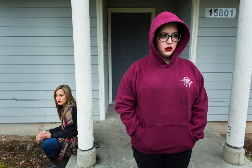 Attorney Bree Black Horse (left) and Renee Davis' foster sister Danielle Bargala at Davis' home.
