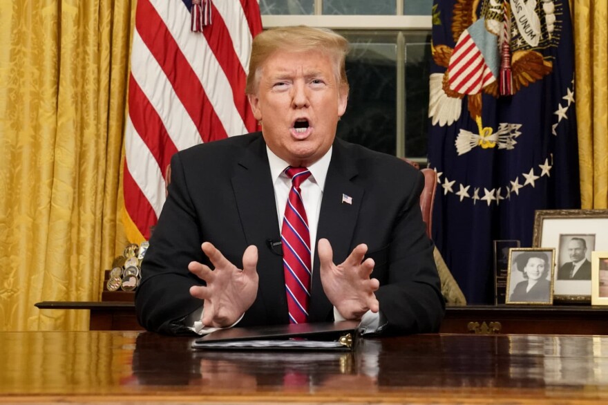 President Trump speaks from the Oval Office as he gives a prime-time address about border security Tuesday. (Carlos Barria/Pool Photo via AP)