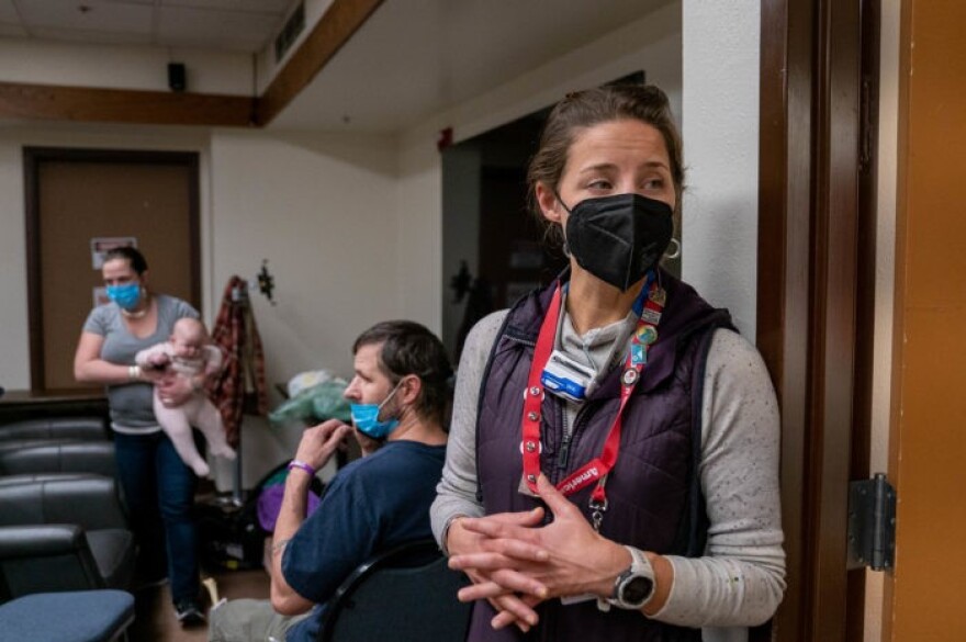 people at an evacuation shelter