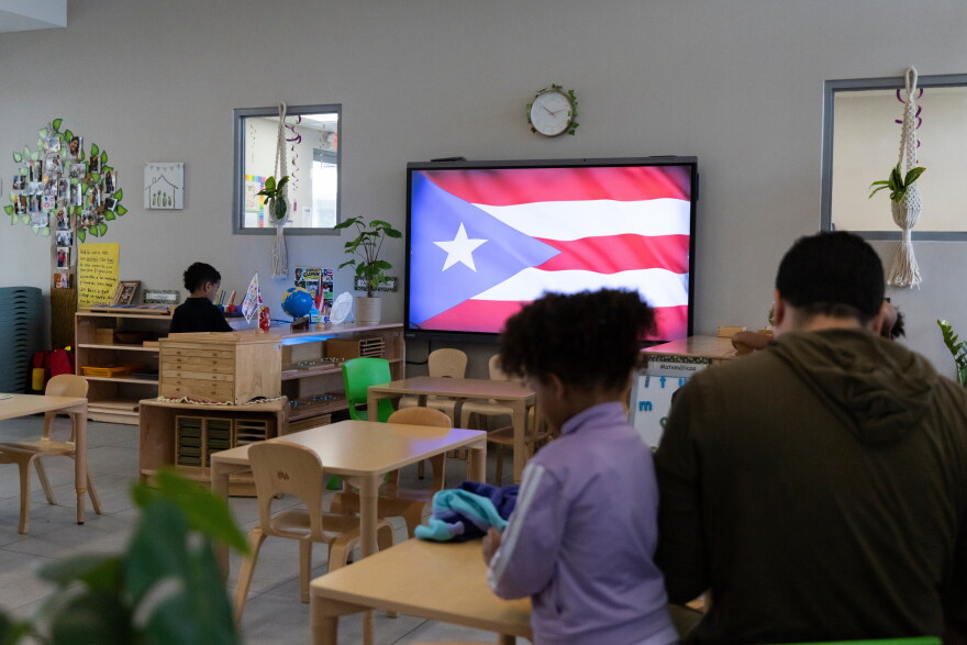 A Puerto Rican flag is displayed on a screen in a classroom at the John Cardinal O’Connor Center for Parent and Child Development, a Head Start center operated by The New York Foundling, in San Juan, Puerto Rico, Tuesday, Oct. 13, 2026.