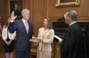 Supreme Court Justice Neil M. Gorsuch takes the judicial oath of office in 2017. Gorsuch may be the deciding vote in a case over whether the Civil Rights Act of 1964 prohibits discrimination based on sexual orientation and gender identity.