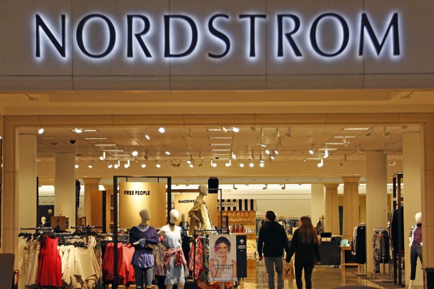 In this Wednesday, Feb. 8, 2017, photo, shoppers walk into a Nordstrom store in Pittsburgh. The White House is rushing to the defense of Ivanka Trump's company, the latest sign the president can't seem to separate the presidency from his family's businesses. (Gene J. Puskar/AP)