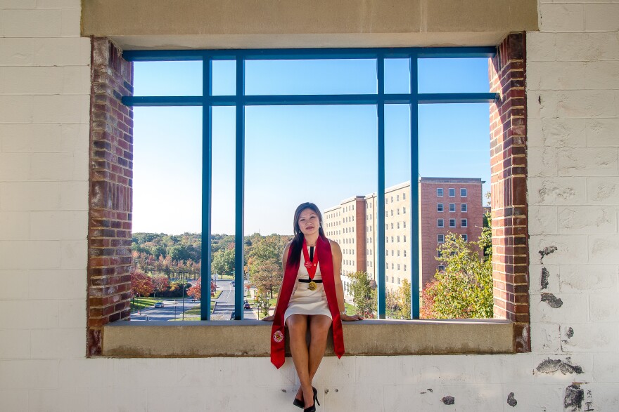 Karie Cheung poses for a graduation portrait at the University of Maryland in College Park, Md.