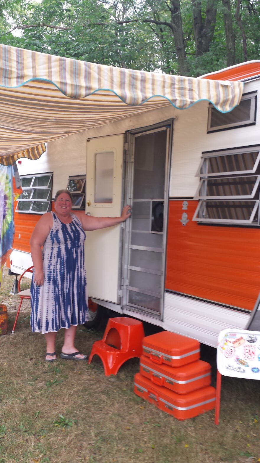 Carolyn Neeley's vintage '72 orange and white Fan camper is named Fanny.