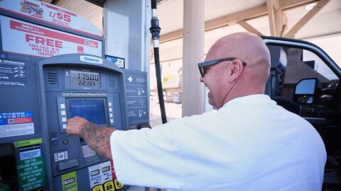 A man in a white T-shirt puts $175 of diesel in his truck at a gas station in Carlsbad, California on Thursday, Sept. 10, 2026.