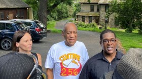 Left to right: Attorney Jennifer Bonjean, Bill Cosby and spokesperson Andrew Wyatt speak outside of Bill Cosby's home on June 30, 2021 in Cheltenham, Pennsylvania. Cosby was released from prison after court overturns his sex assault conviction. (Michael Abbott/Getty Images)