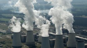 Steam rises from cooling towers at the Jaenschwalde coal-burning power plant on Aug. 20, 2010 near Cottbus, Germany. (Sean Gallup/Getty Images)
