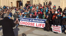 Bishop Salvatore Matano leads some of the local people headed to Washington in prayer.