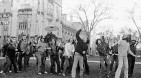 Yale University students join in a Frisbee game Wednesday, April 10, 1974. (Bob Child/AP)
