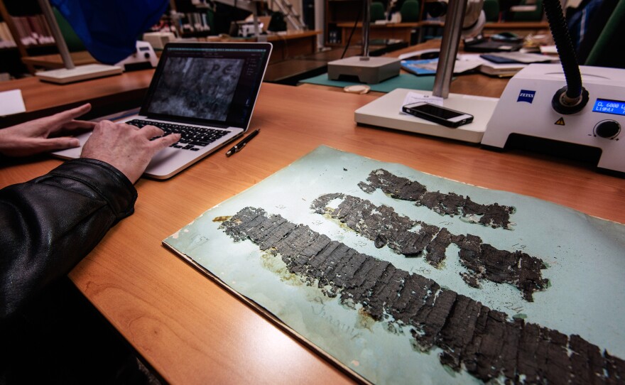 Even the most careful unrolling of the scrolls leads to their destruction.