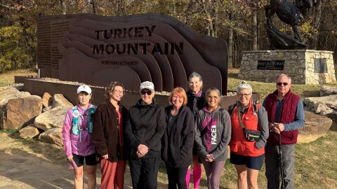 The "Hiking Buddies" program gets ready to head to the trail. The group gets together for guided hikes to make the trek through the trails feel safer