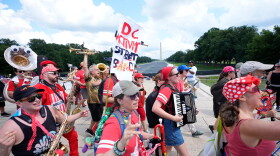 A group of local activist from Washington DC, demonstrating during the March on Washington rally at the Lincoln Memorial on the National Mall, Friday, Aug. 28, 2026 in Washington.