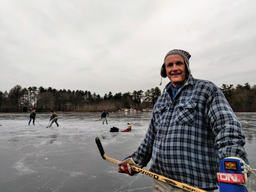 Massachusetts state geologist Steve Mabee, and UMass colleagues, marvel at the ice on Metacomet Lake in Belchertown, Massachusetts, on January 18, 2019.