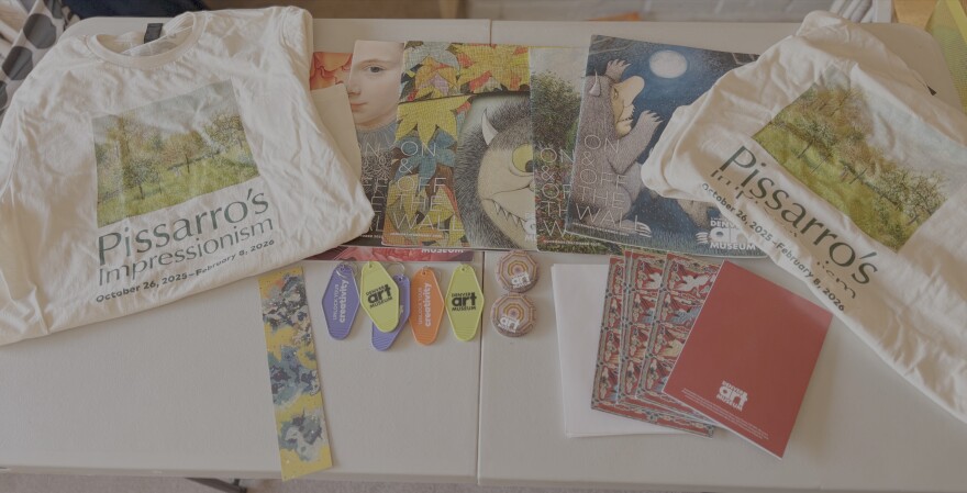 A package of items from the Denver art museum and zoo in Colorado.