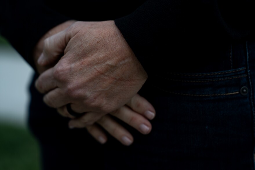 Susan Martin pauses outside her home Tuesday, Dec. 9, 2025, in O’Fallon, Mo. She is raising concerns about unsafe conditions at the St. Louis County Jail after hearing about them from Christian Martin, a current detainee at the Buzz Westfall Justice Center in Clayton.