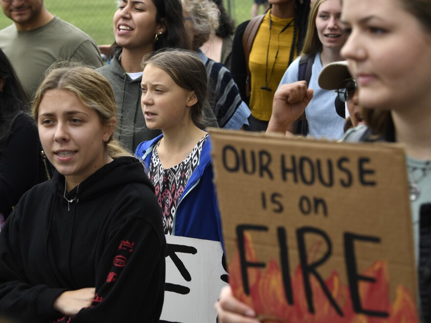 Swedish climate activist Greta Thunberg (center) marches with other young climate activists last week outside the White House in Washington, D.C. [Susan Walsh / AP]