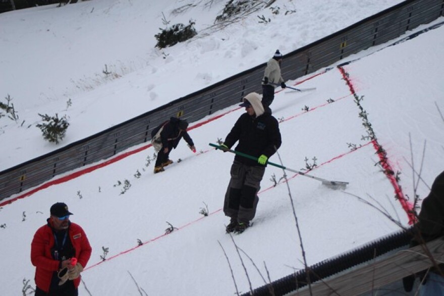 Workers preparing the Pine Mountain Ski Jump on Saturday February 21, 2026 during the Pine Mountain Continental Cup.