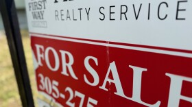 A "for sale" sign hangs outside a Miami-Dade home in Feb. 2026.