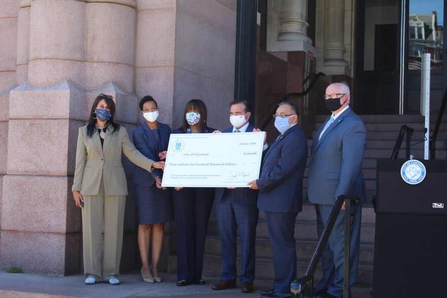 Various representatives from Cincinnati received a check for $3.5 million from the U.S. Department of Housing and Urban Development at City Hall on Oct. 13, 2020.