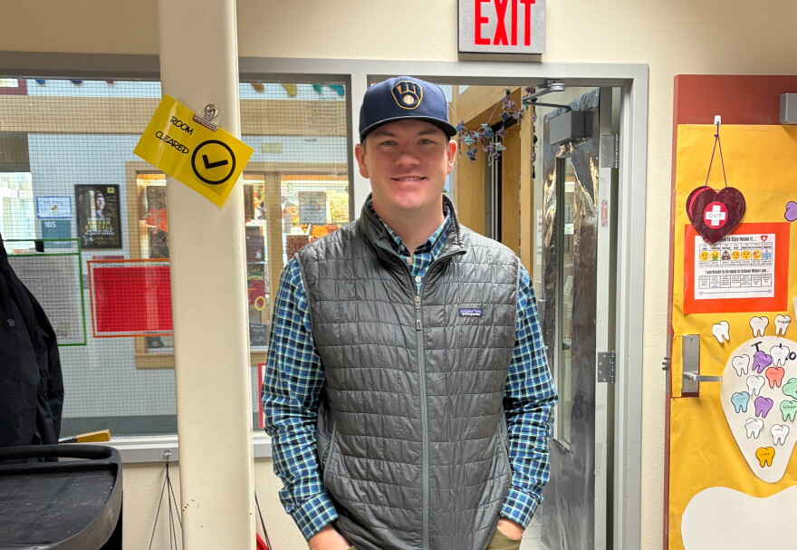 Eagle’s View Elementary School Principal Riley Spetz, a lifelong Milwaukee Brewers fan, wears a Brewers cap.