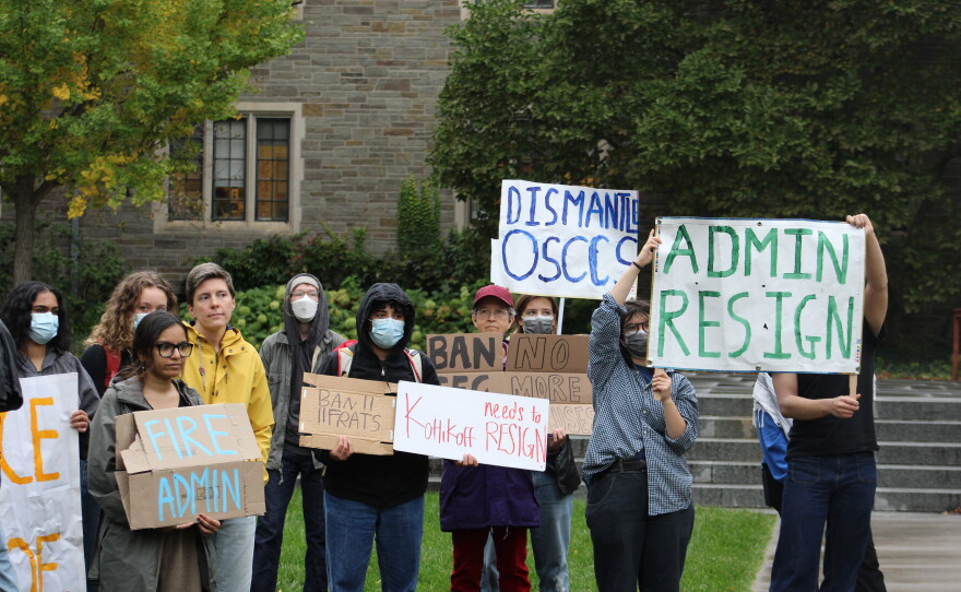 Protesters gathered in a courtyard outside the meeting of the Cornell Board of Trustees on Friday.