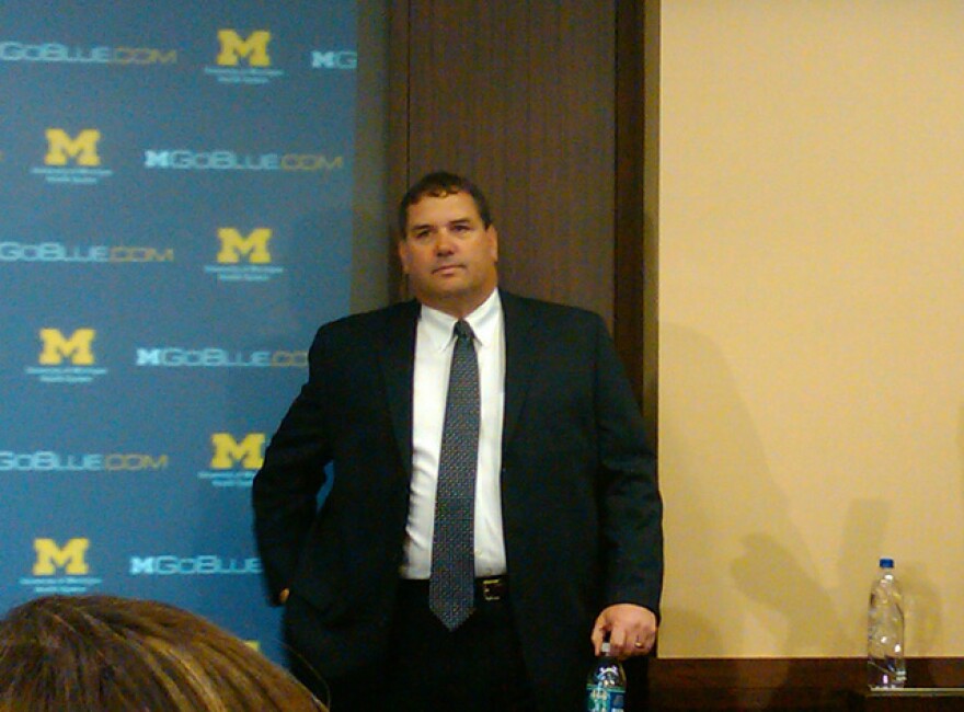 Brady Hoke awaits the media at his first press conference as Michigan's head coach earlier this year.