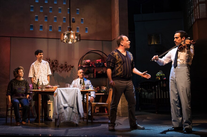 Left to right: Kristen Sieh, John Cariani, Alok Tewari, Andrew Polk and George Abud in "The Band's Visit." (Courtesy Matthew Murphy)
