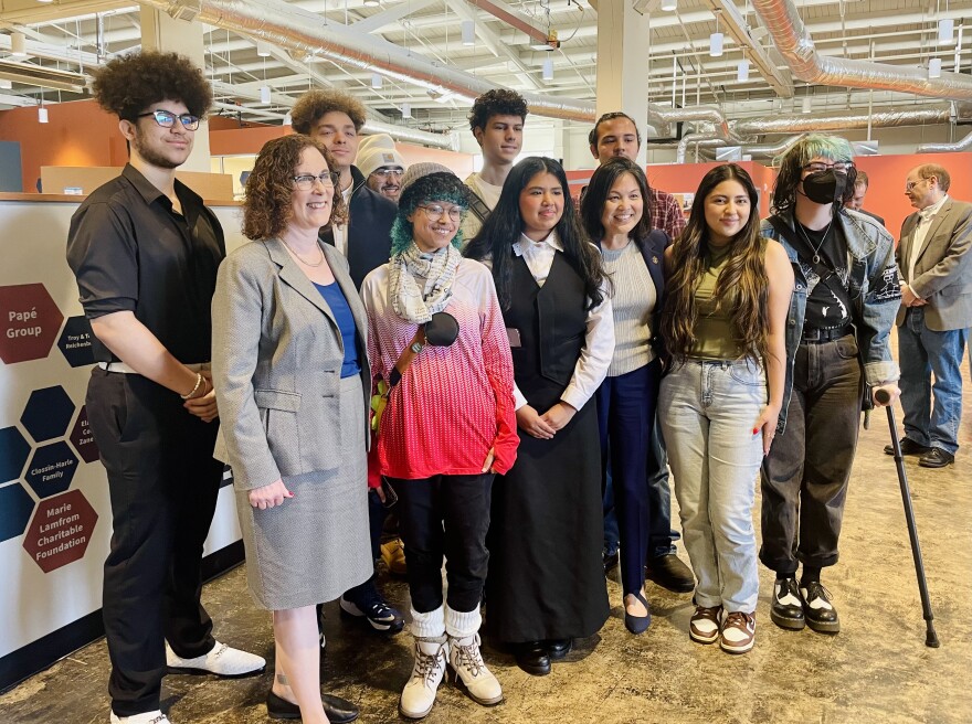 Group of people posing for the camera.