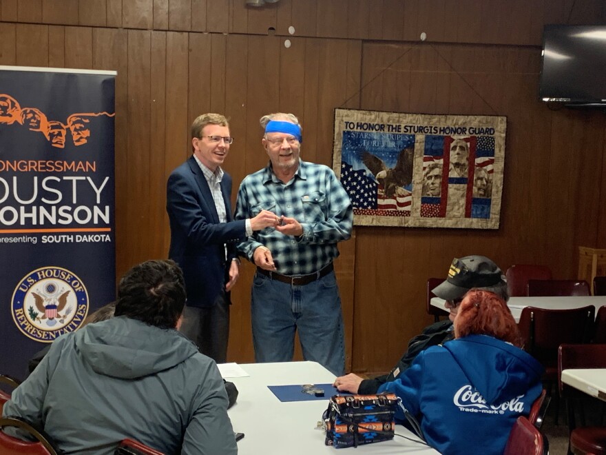 Representative Dusty Johnson poses for photo with Vietnam Veteran John Pyle of Sturgis