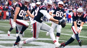 New England Patriots tight end Mike Gesicki, center, celebrates with teammates after his touchdown against the Buffalo Bills during the second half of an NFL football game, Sunday, Oct. 22, 2023, in Foxborough, Mass. (AP Photo/Michael Dwyer)