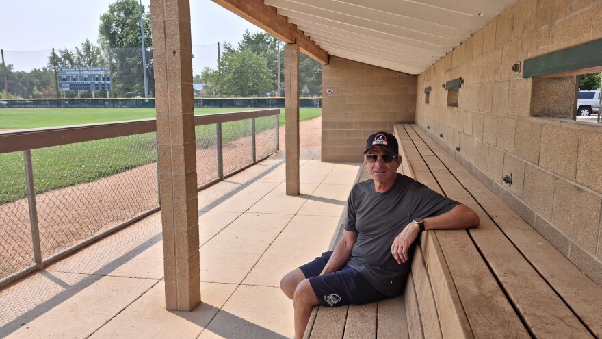 Tony Rouco, manager of the Boulder Collegians baseball team, in the bleachers at Scott Carpenter Park in Boulder, Colorado.