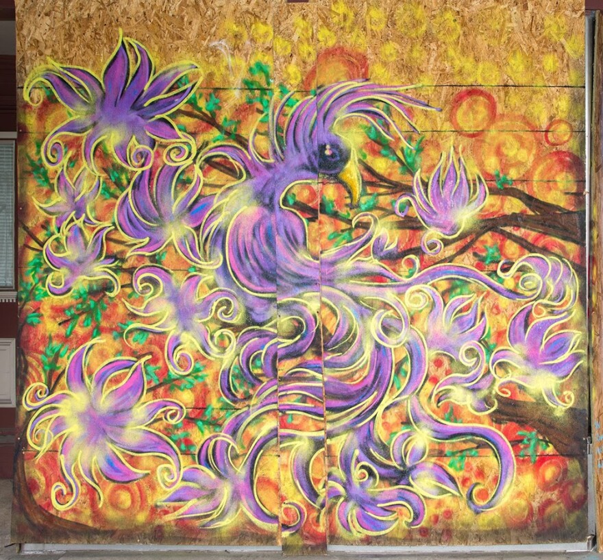 Many hands helped create this untitled piece at Café Natasha on South Grand Boulevard. The lead artist was Bradley Pipkin.
