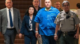 Lt. Gov. Sylvia Luke, second from left, arrives for a court appearance at Kaʻahumanu Hale, accompanied by her attorney and security detail in Honolulu, Thursday, July 30, 2026.