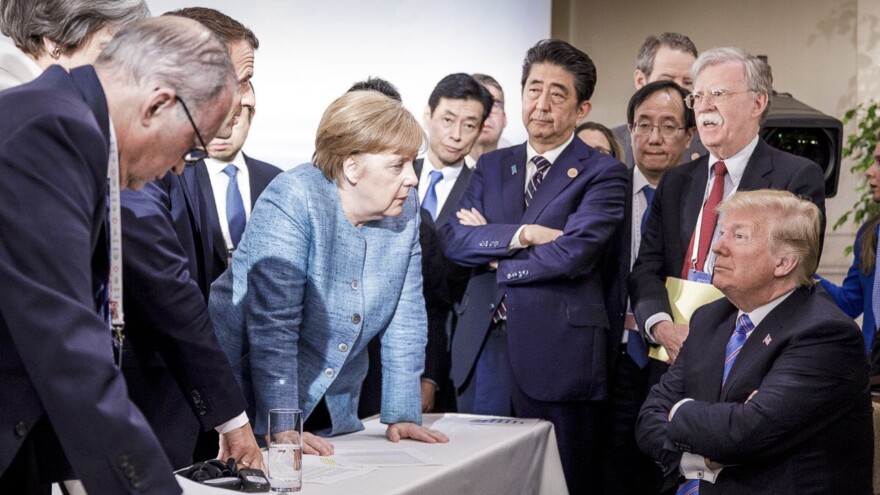 President Trump speaks with other leaders, including German Chancellor Angela Merkel, center, during the G7 Summit in Quebec, Canada on June 9. Trump has frequently criticized some of America's closet allies on matters such as trade tariffs.