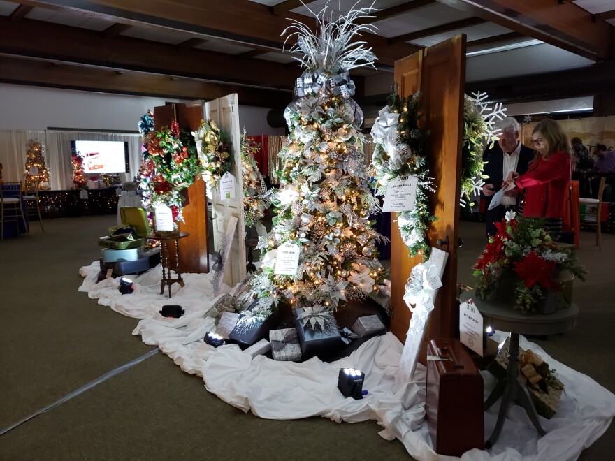 The annual Festival of Trees raises around $120,000 for the child welfare nonprofit Crittenton Centers. This photo was taken at the 2019 Jingle & Mingle event. It's not yet clear if this year's festival will take place in-person.