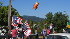 Protesters on the Harlow Road bridge connecting Eugene and Springfield, July 17, 2025.
