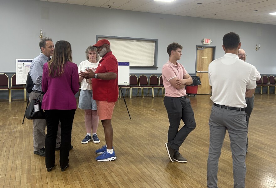 Rep. Frank Cooke talks with DelDOT members and the public about the possibility of a new passenger rail station in Newport.