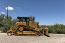 A bulldozer bearing the logo of Southwest Valley Constructors was seen near the entrance to Cottonwood Campground along the U.S-Mexico border in Big Bend National Park on Tuesday.