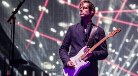 Ed O'Brien of Radiohead preforms. (Amy Harris/Invision/AP)