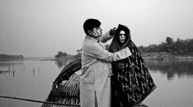 Anukul Ghosh (left), 63, and Rabin Kumar Majhi, 51, pose as a newly married couple. Ghosh used to play female characters in the 1970s and 1980s. He has now retired from Jatra.