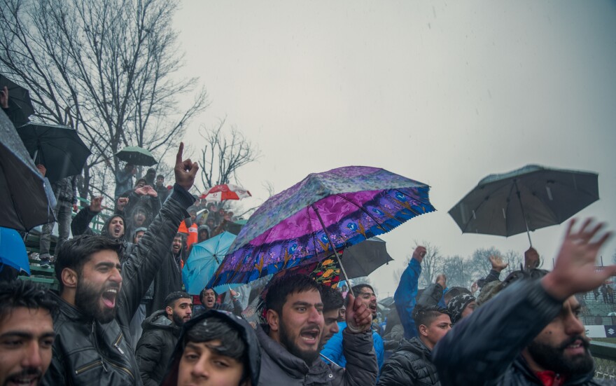 Fans braved sleet and snow to watch Real Kashmir play a home game on Feb. 6 in Srinagar.