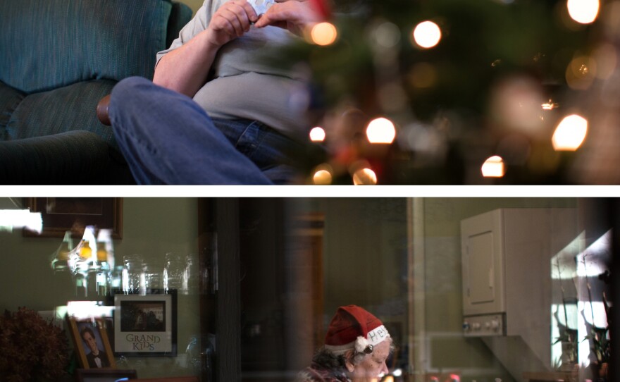 "For me the hard part is that my mother-in-law is still with us physically, but mentally she's not there," Mary says. "It's almost like having somebody that's a stranger at Christmas." Helen sorts through family photos. She often talks about life on the farm in Virginia where she grew up.