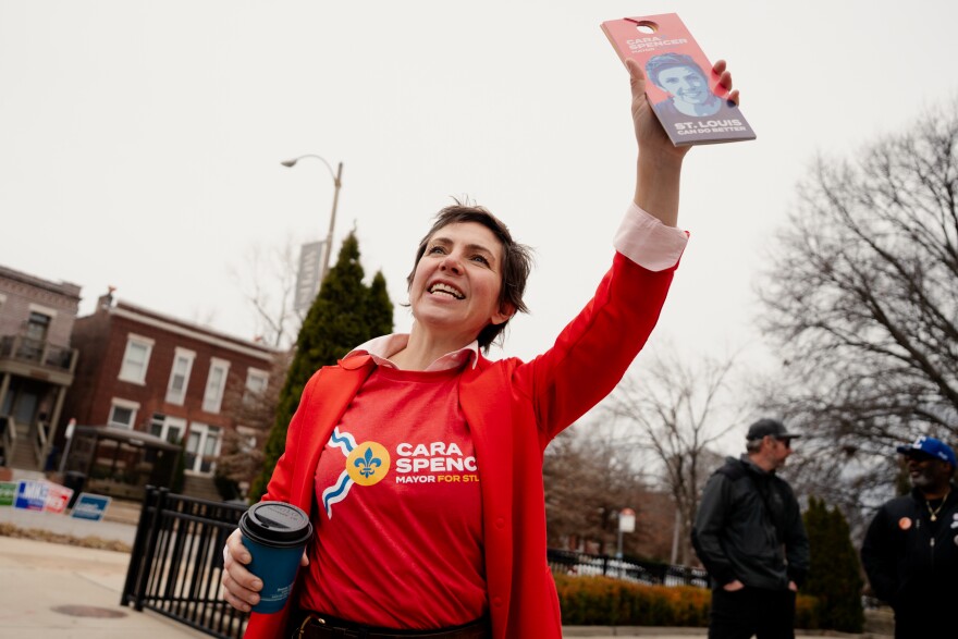 Cara Spencer, 8th Ward alderwoman and mayoral candidate, thanks passerby voters for casting their ballots in St. Louis’ city-wide primary election outside the Wild Carrot Event Space on Tuesday, March 4, 2025, in the city’s Shaw neighborhood.