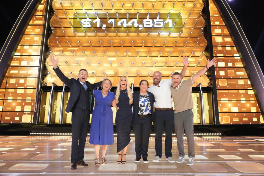"The Wall" host Chris Hardwick, at left, with Emma Nelson, Chrissy Lovitt, and their family members who came to support them.