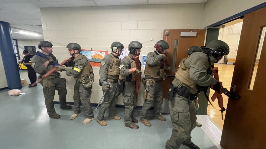 Waterford Police Special Response Team sweep through Quaker Elementary School during an active shooter drill.