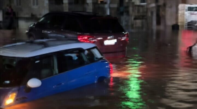 Cars are seen flooded in a Kahuku, Oʻahu, neighborhood on the night of March 19, 2026.