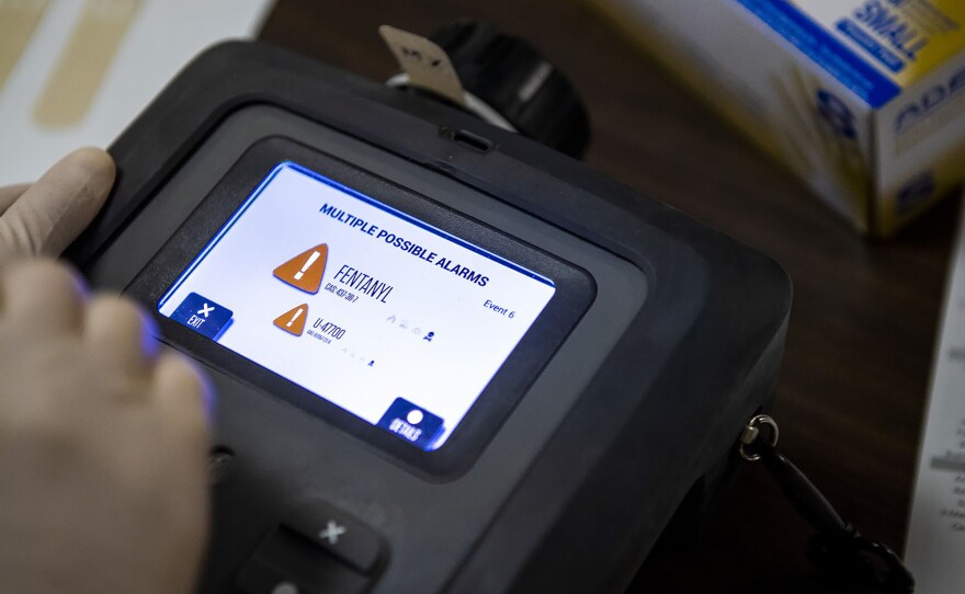 The MX908 detects the possible presence of fentanyl in a drug sample.