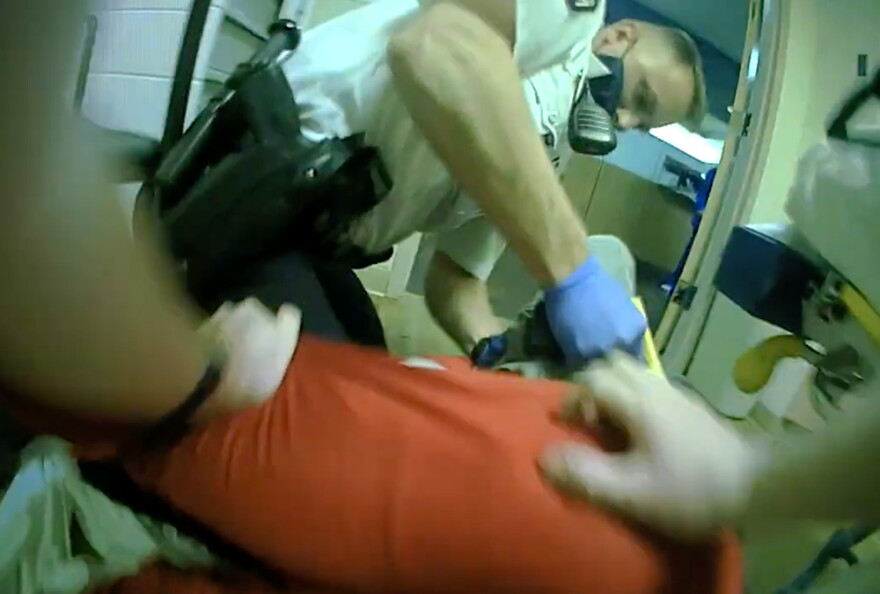 Police body camera footage of a struggle with Miles Jackson inside St. Ann's Hospital in Westerville on April 12, 2021.