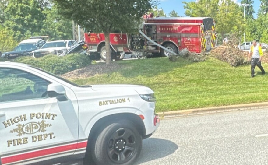 A photo of a High Point Fire Truck involved in a fire crash after it tried to avoid a collision.